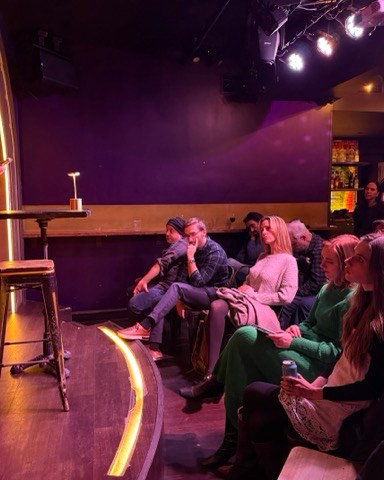 A reader at a Writing Group event in New York City