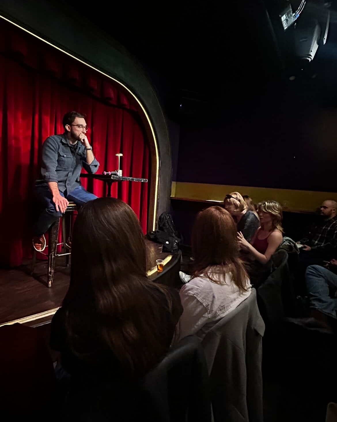 A reader at a Writing Group event in New York City